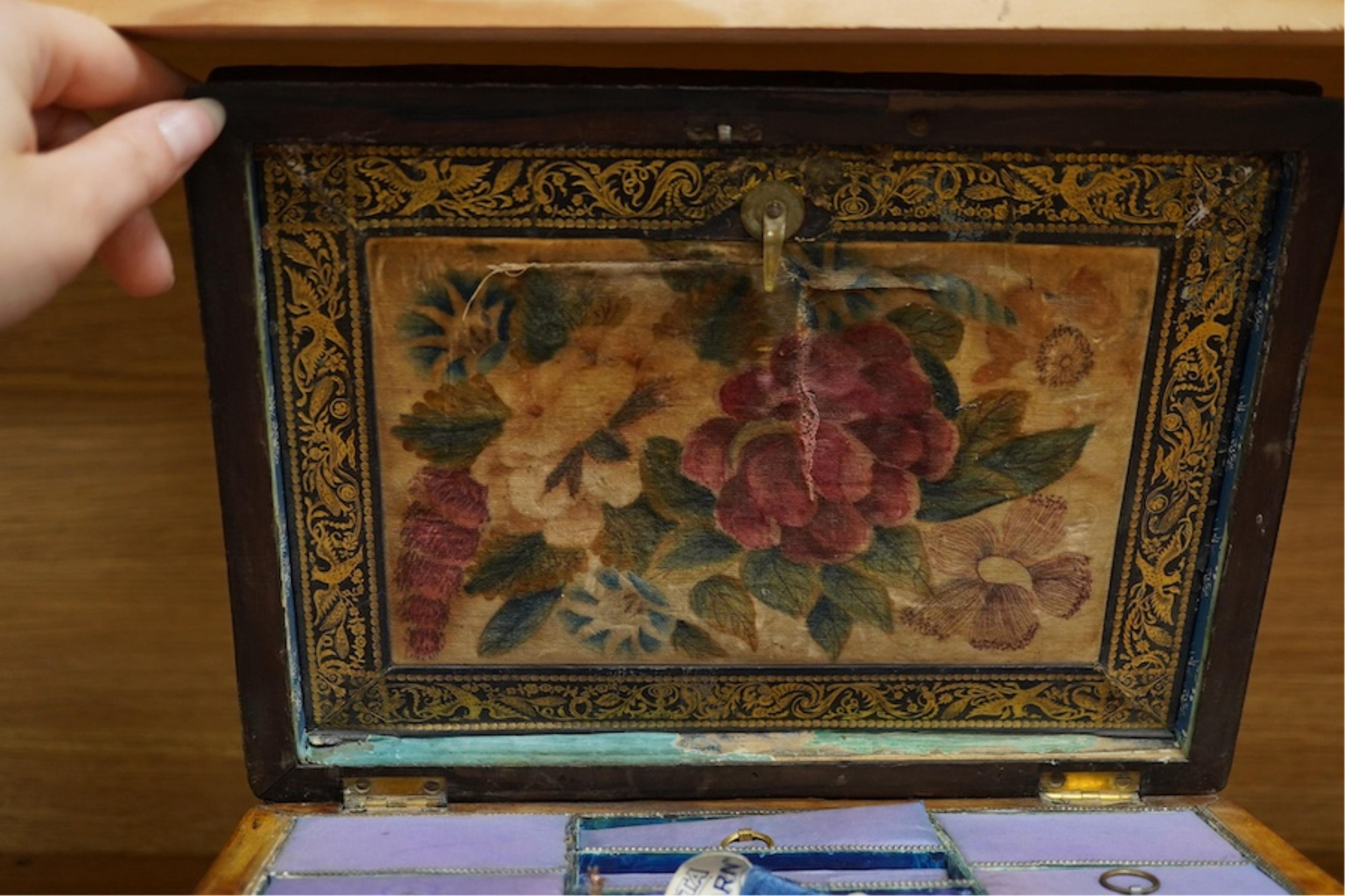 A Victorian burr walnut pagoda’ shaped sewing box incorporating a folding writing slope, 28cm wide. Condition - poor to fair